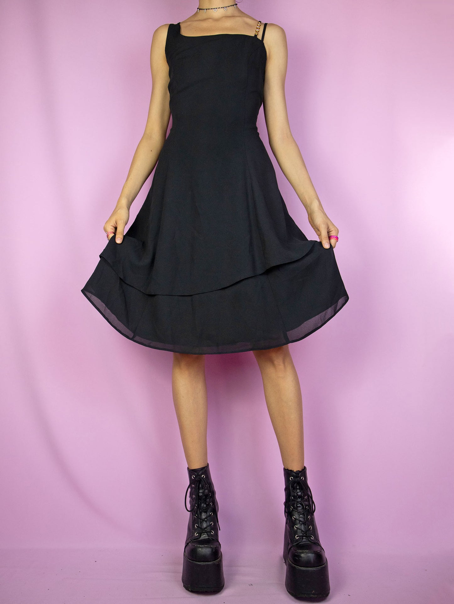 The Vintage 90s Black Asymmetric Layered Dress is an elegant cocktail party mini dress with double straps, rhinestone detailing and back zip closure.