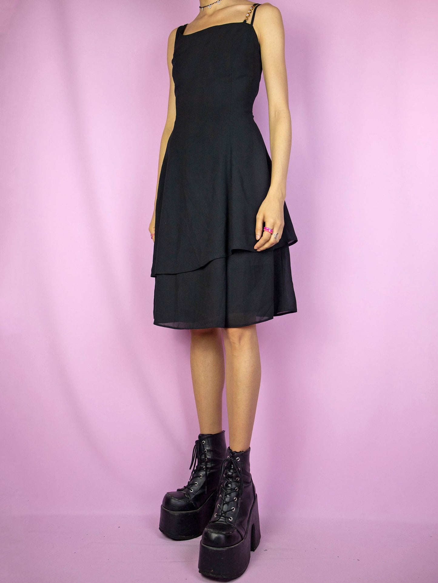 The Vintage 90s Black Asymmetric Layered Dress is an elegant cocktail party mini dress with double straps, rhinestone detailing and back zip closure.
