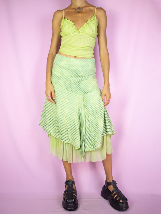 The Y2K Asymmetrical Layered Midi Skirt is a vintage 2000s green striped print skirt featuring pointed asymmetric layers, a semi-sheer mesh hem, and an elastic waist. Perfect for summer, festival, and party outfits.