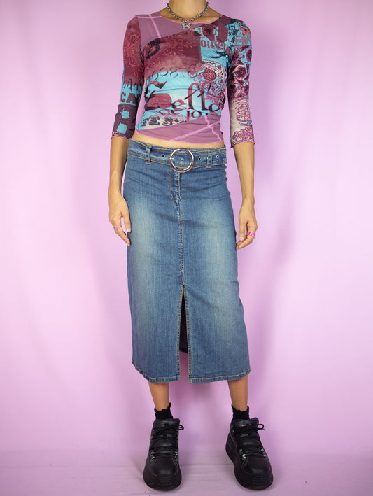The Y2K Denim Midi Skirt is a vintage 2000s cyber grunge inspired stretchy jean maxi skirt with a front slit, belt buckle and zipper closure.