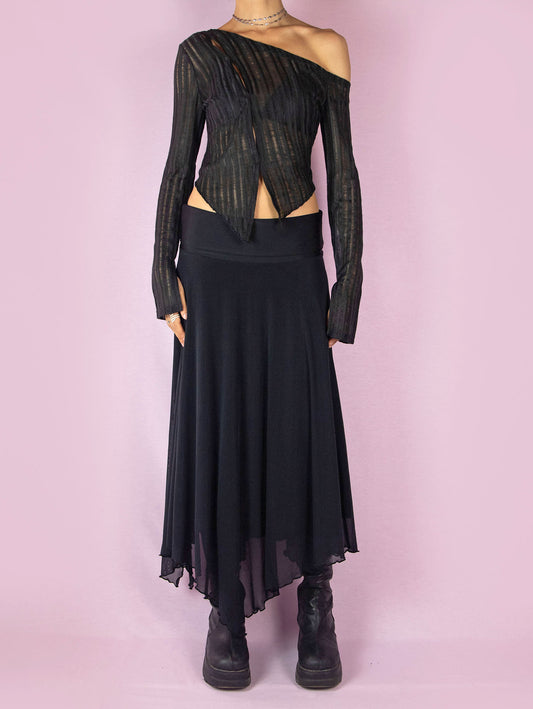 The Y2K Black Mesh Maxi Skirt is a vintage 2000s deconstructed subversive night-out party midi skirt with an elastic waist and an asymmetrical handkerchief hem.