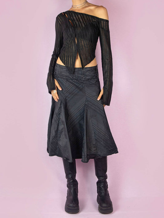 The Y2K Black Godet Circle Skirt is an elegant vintage 2000s midi skirt with a pinstripe pattern and side zipper closure.