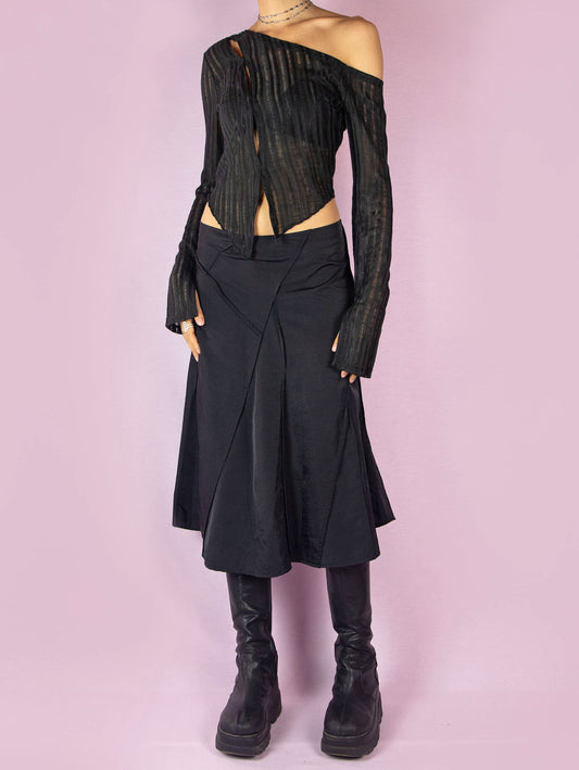 The Y2K Subversive Black Midi Skirt is a vintage 2000s elegant party night out godet circle skirt with a back zipper closure.