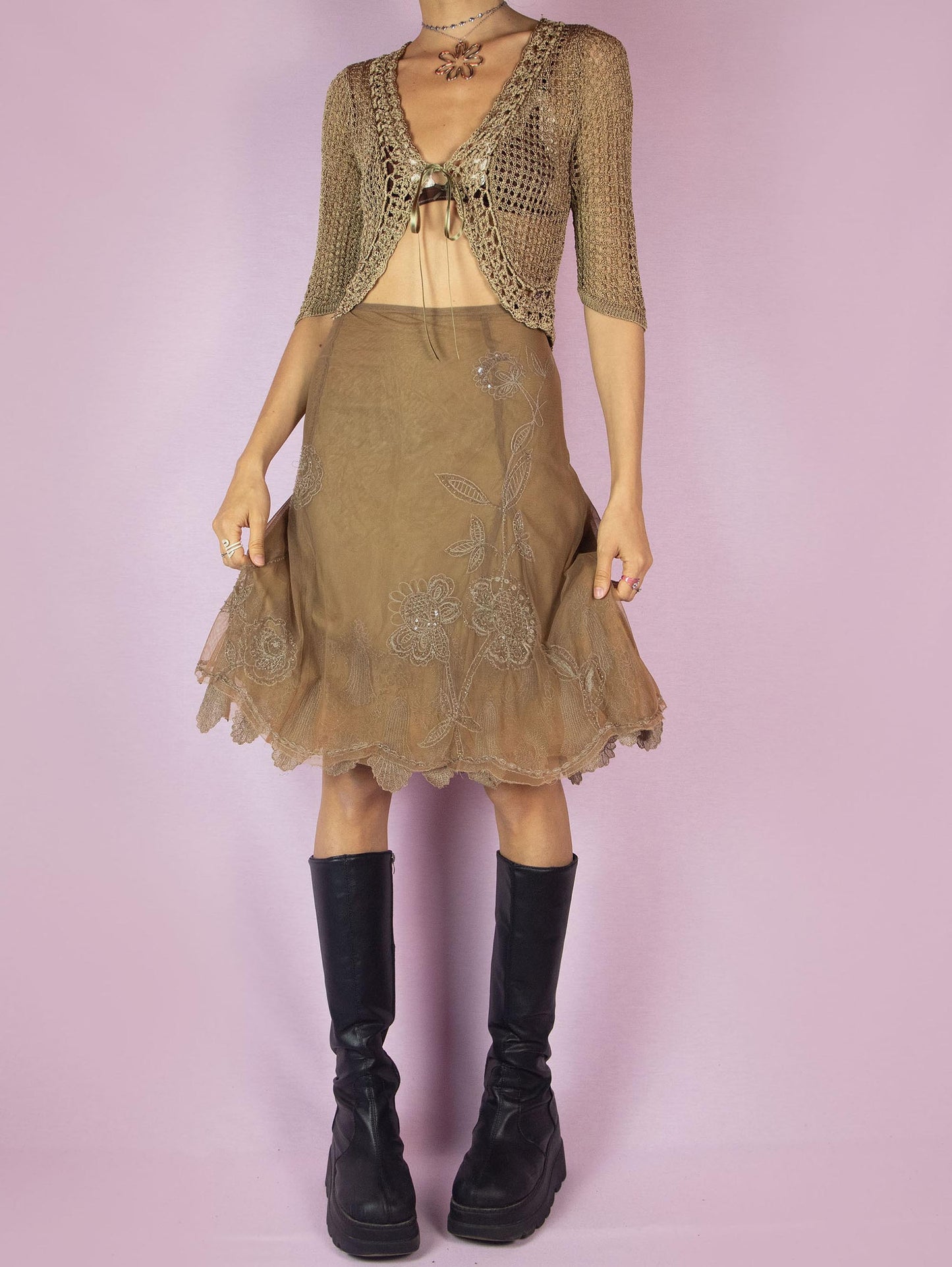 The Y2K Brown Mesh Tulle Skirt is a vintage 2000s elegant and romantic evening party style trumpet midi godet skirt embellished with sequins and beads, featuring a side zipper closure and with floral embroidered details.