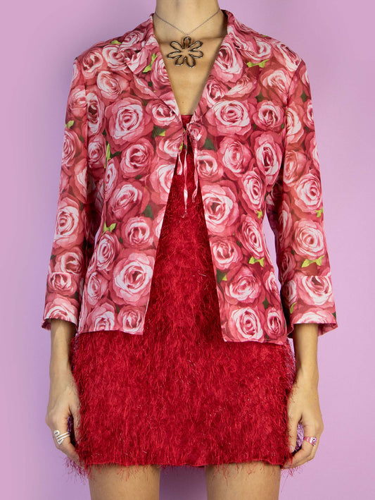 The Y2K Red Floral Print Top is a vintage 2000s boho summer style semi-sheer rose graphic blouse bolero jacket with three-quarter sleeves.