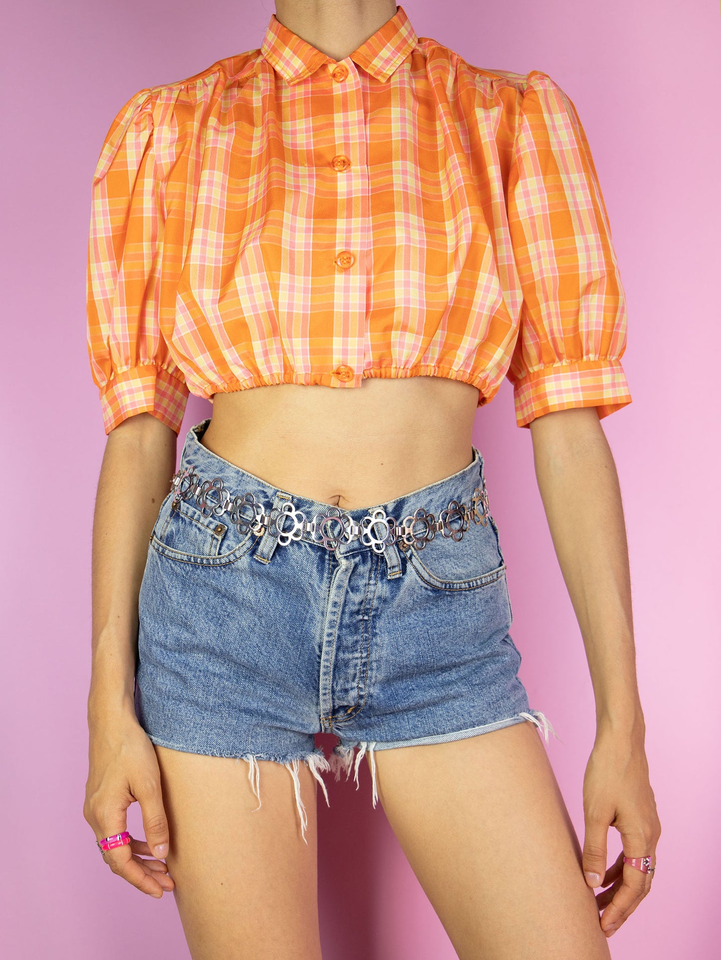 The Y2K Orange Plaid Crop Top is a vintage checkered cropped shirt with a collar, buttons, and puff sleeves. Cottage prairie 2000s country western summer gingham blouse.