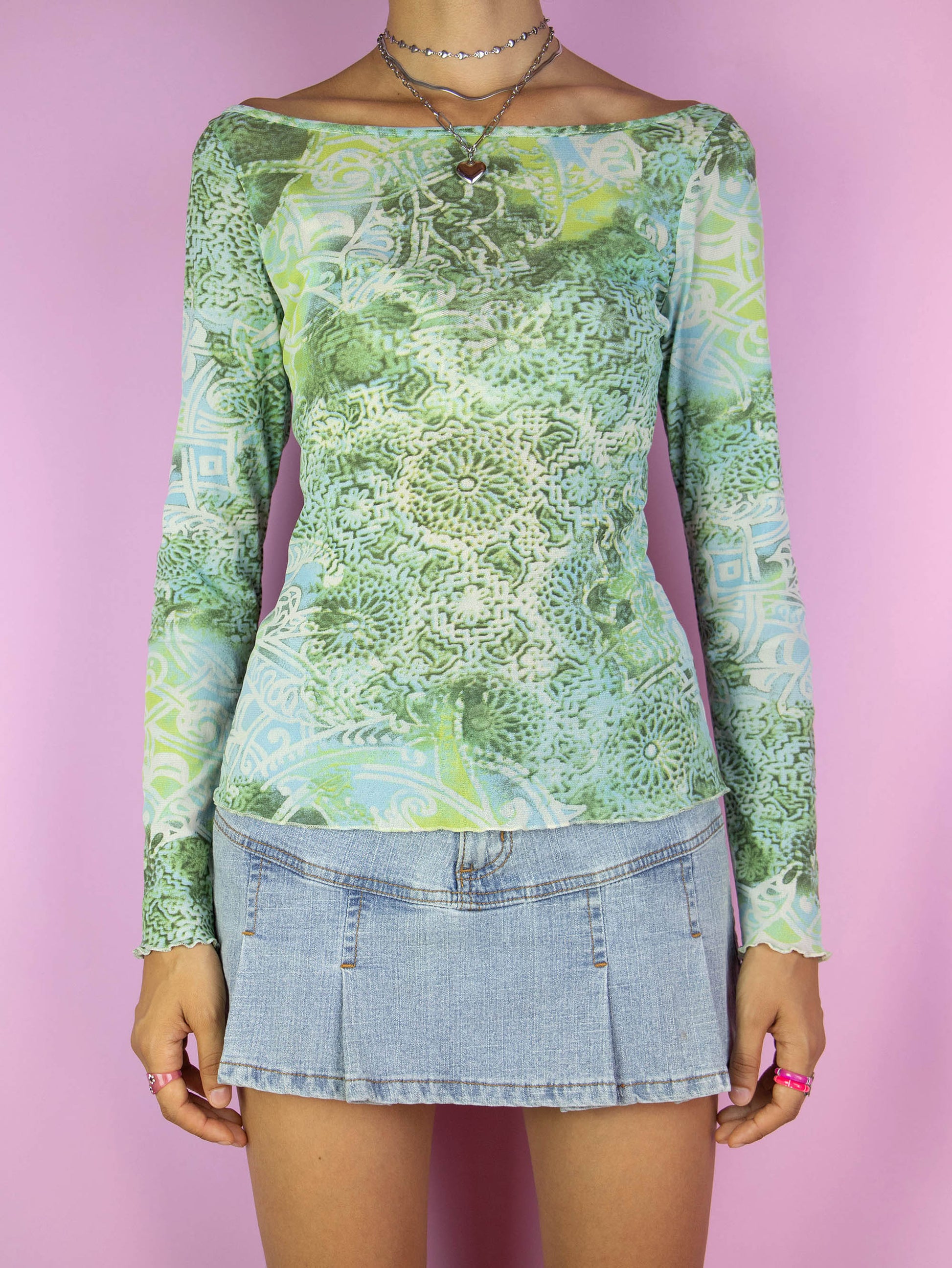  The Vintage Y2K Green Abstract Mesh Top is a long-sleeve, abstract light green, blue, and beige semi-sheer mesh blouse. Lovely cyber grunge summer shirt from the 2000s. Ideal for festivals, raves, and clubbing.