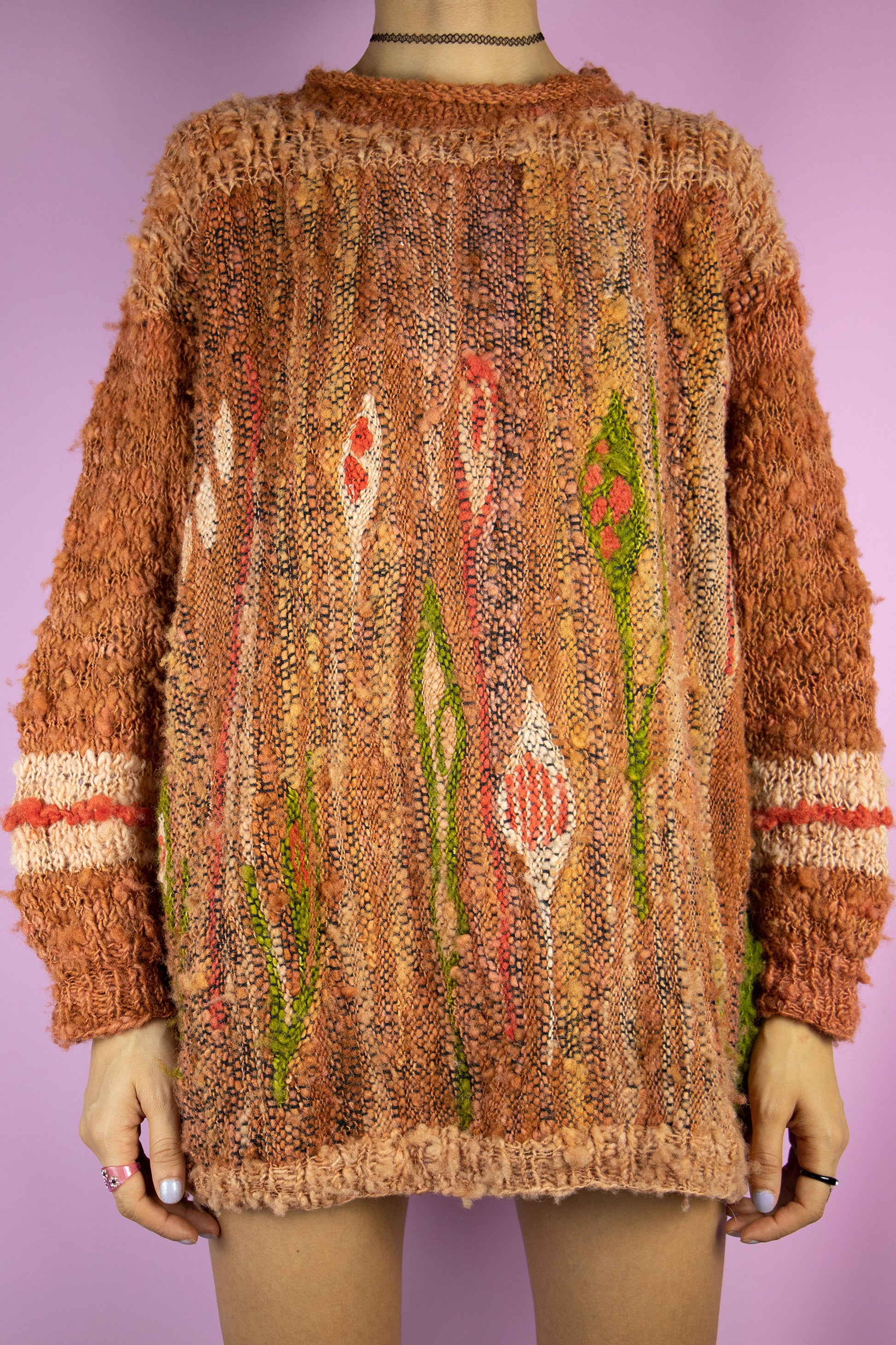 The Vintage 90s Chunky Knit Sweater is a terracotta orange and green knitted pullover with abstract crazy pattern. Boho grunge 1990s avant garde sweater.