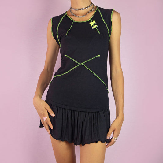 The Y2K Black Sleeveless Top is a vintage 2000s piece featuring neon green stitching details and a fitted silhouette, channeling a cyber goth aesthetic.